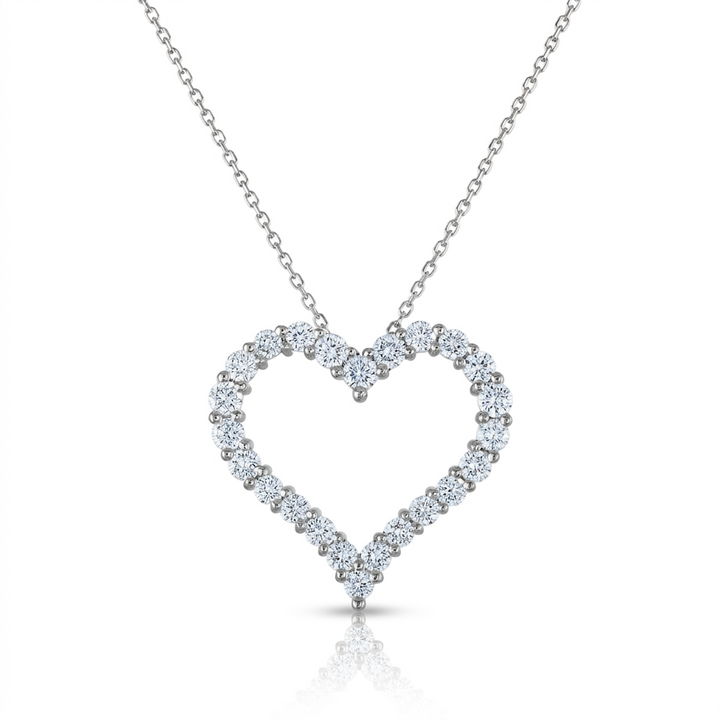 Diamond-encrusted open heart pendant necklace in 14K white gold.