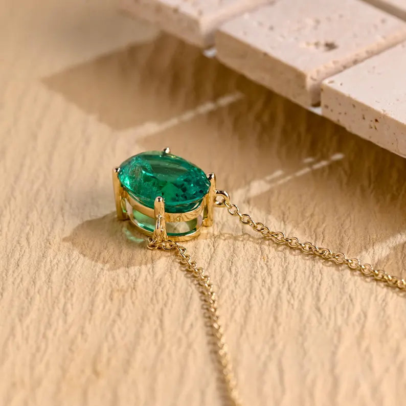 Green emerald gemstone pendant close up