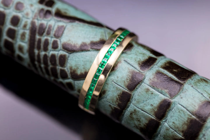 Green gemstone wedding band luxury jewelry