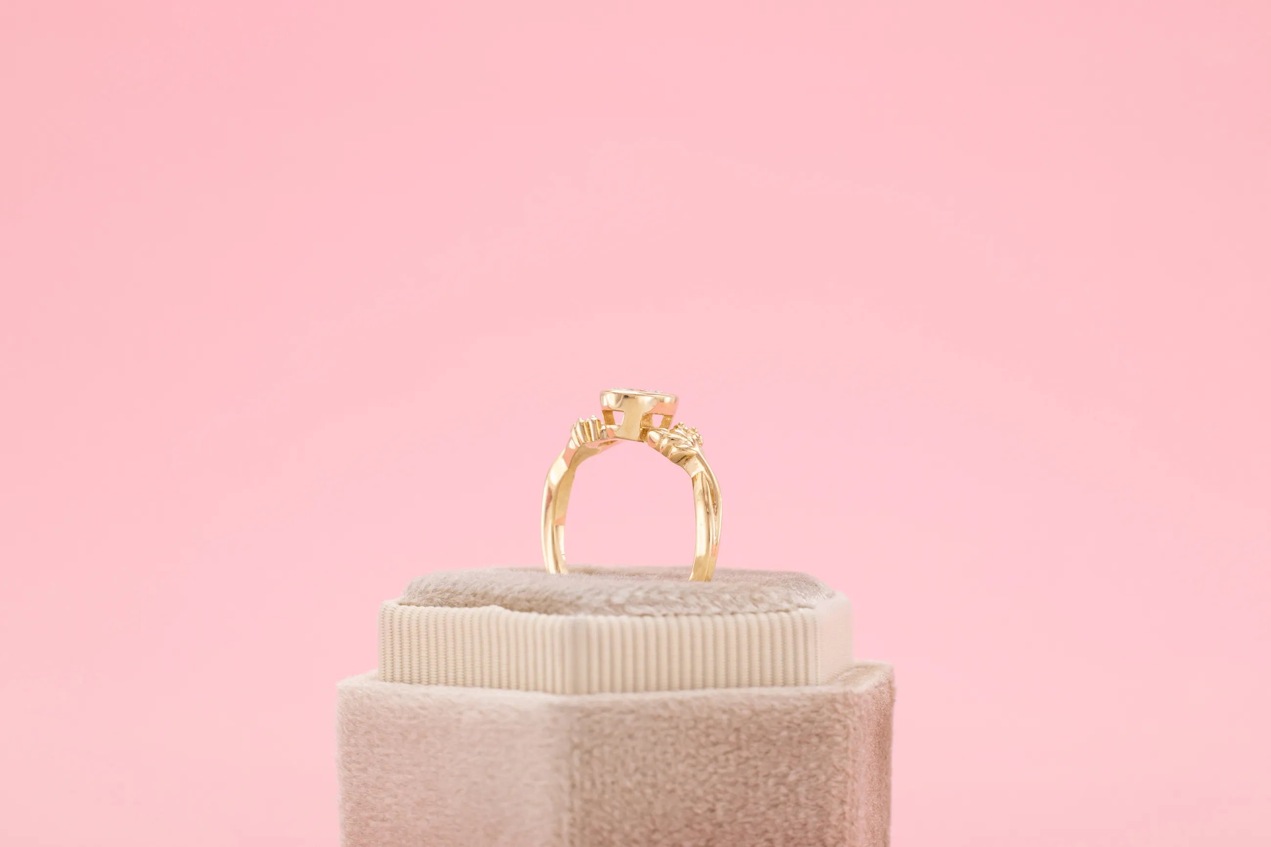 bezel set oval engagement ring yellow gold