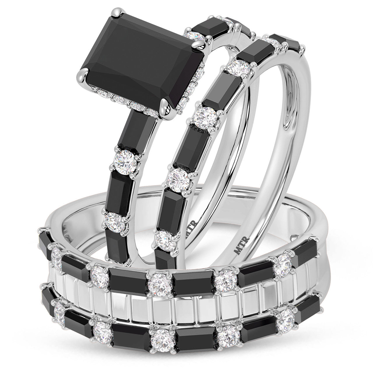 “emerald centerpiece with black onyx baguette accents”