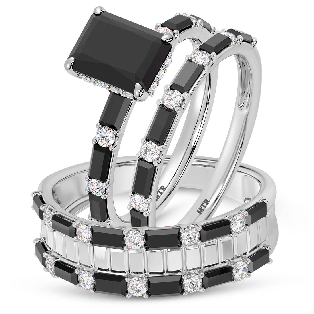 “emerald centerpiece with black onyx baguette accents”