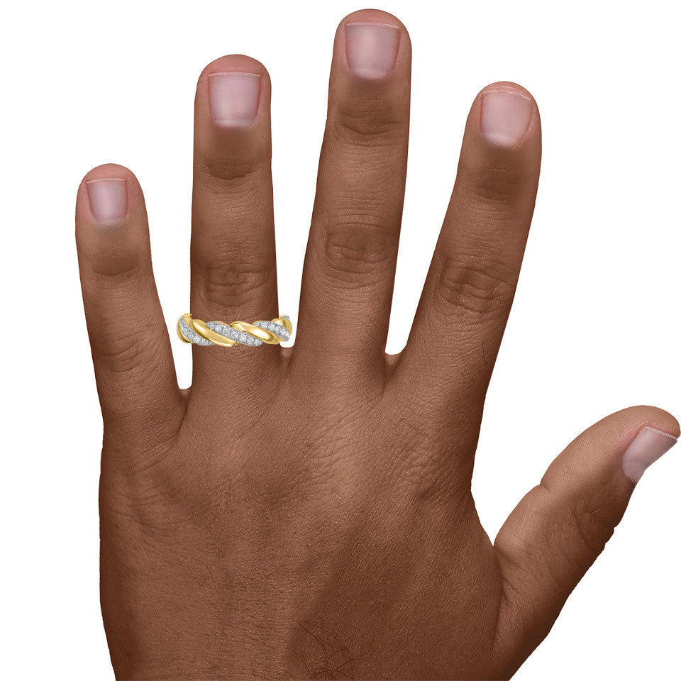 Hand wearing a gold ring with a diamond on a white background