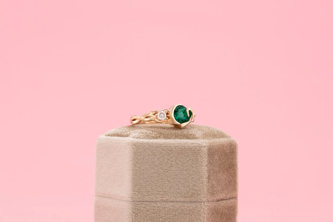 handcrafted emerald solitaire ring