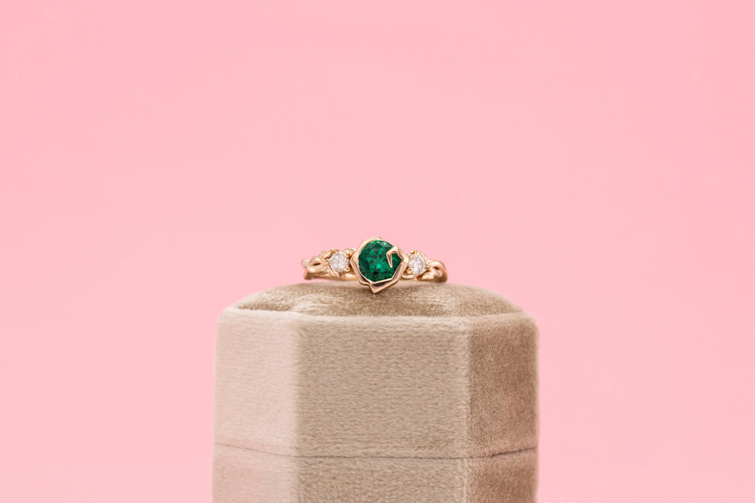 unique emerald proposal ring